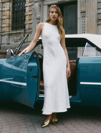 FemAttireMo: Unveiling the Essence of Women's Strength through Bespoke Fashion